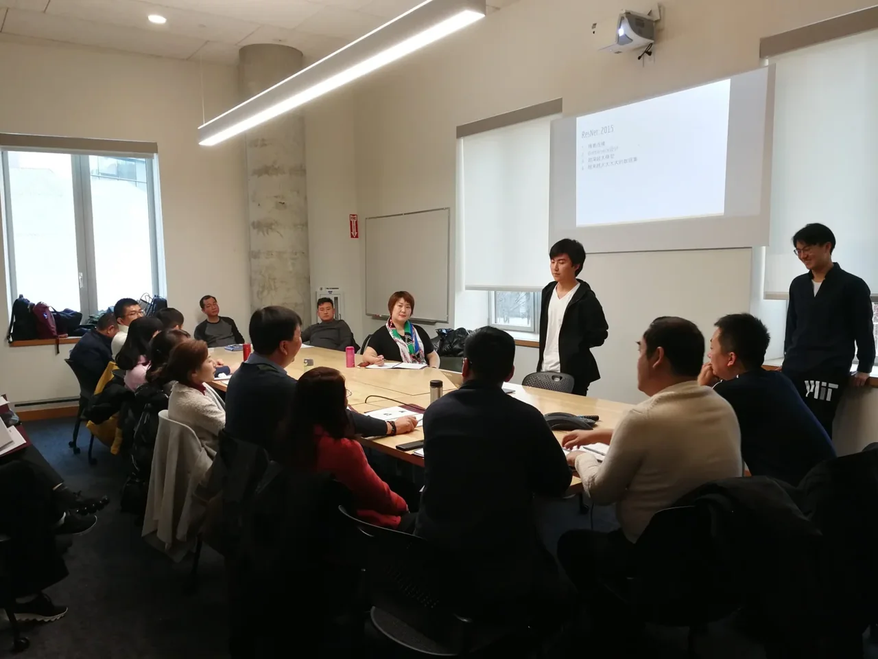 Participants in an academic session during a past program.